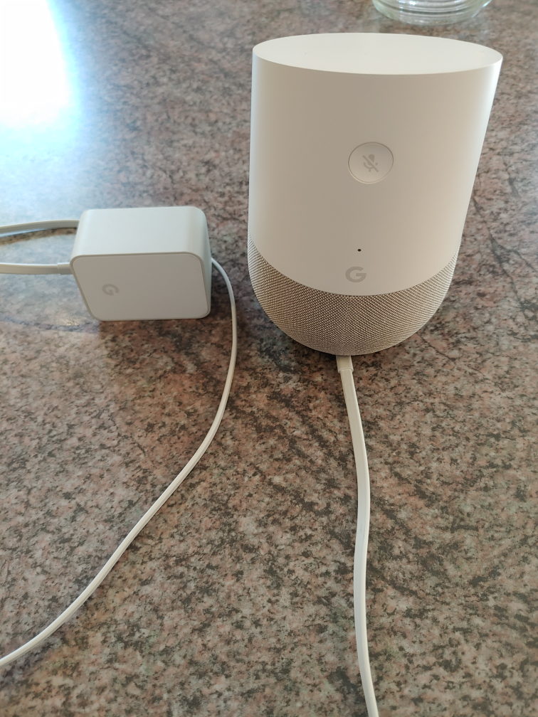 Google Home speaker with charger