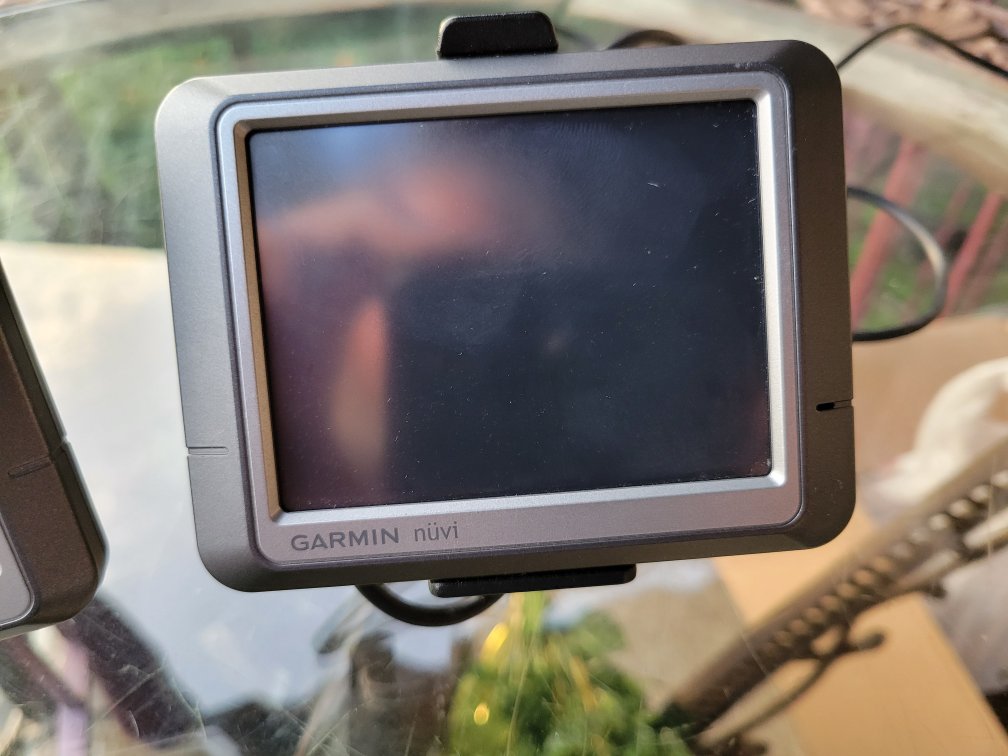 2x Garmin GPS units with car mounts and adapters - photo 2
