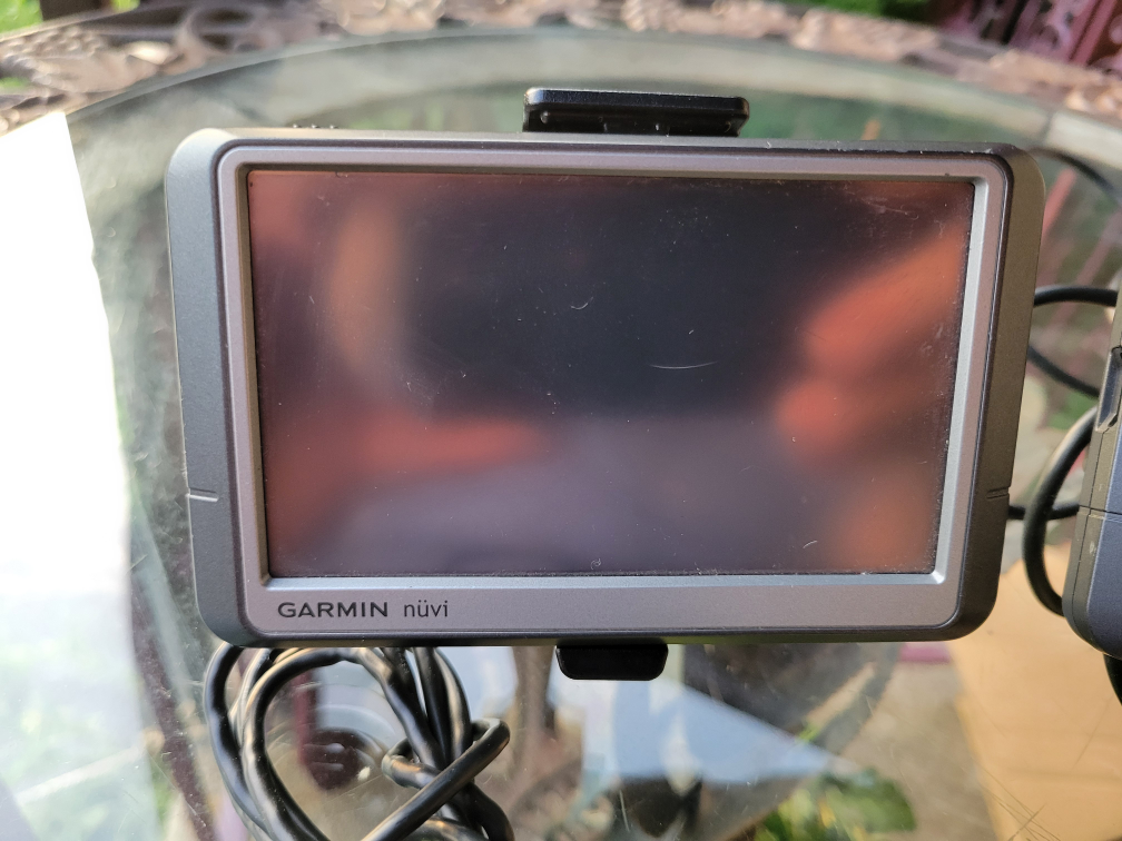 2x Garmin GPS units with car mounts and adapters - photo 3