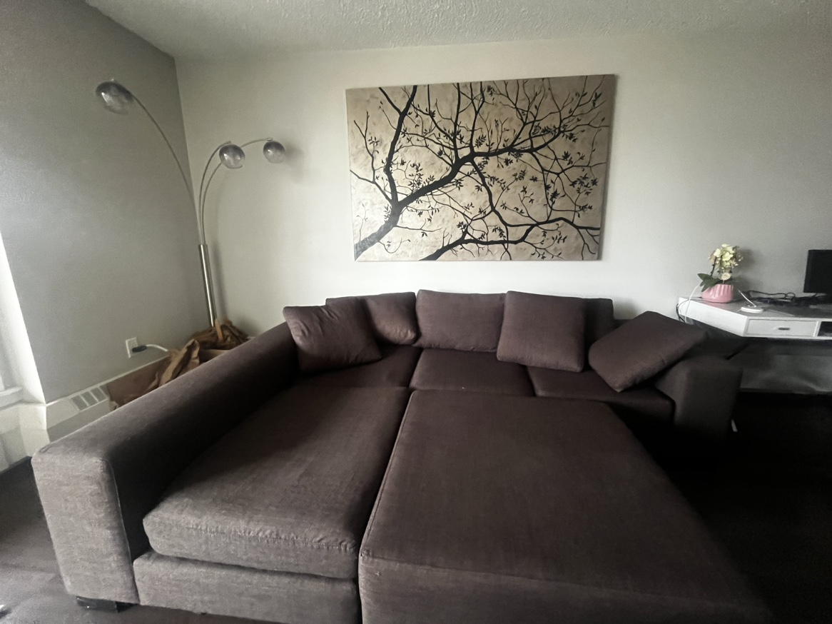 Large dark grey sectional with ottoman - photo 4