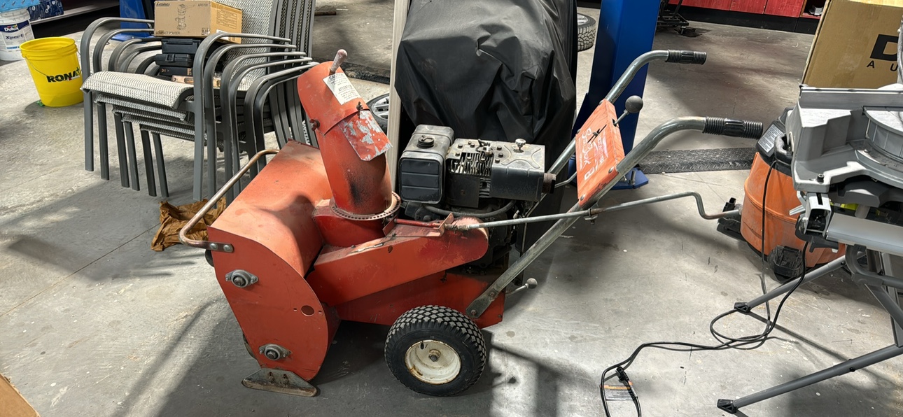 Double head chain drive snow blower