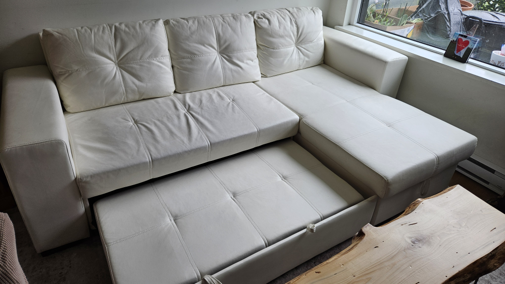 faux white leather L shape couch image indicator(4)