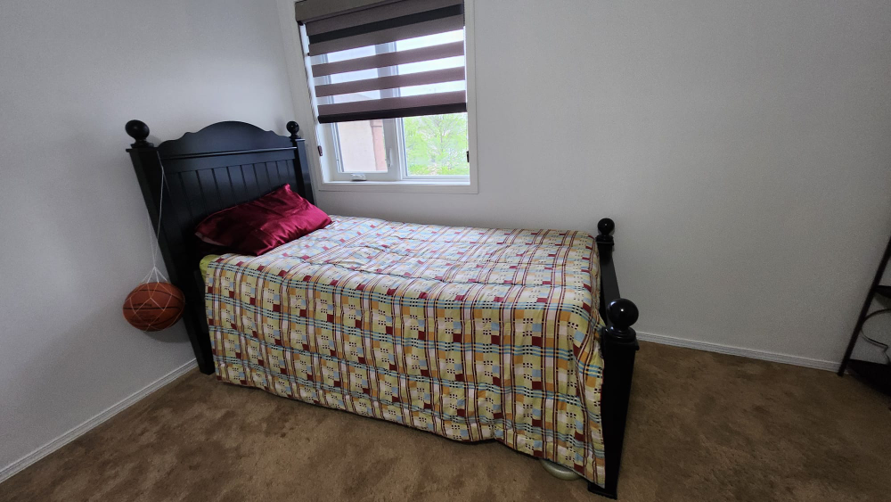 Twin size  bedframe with a night stand.