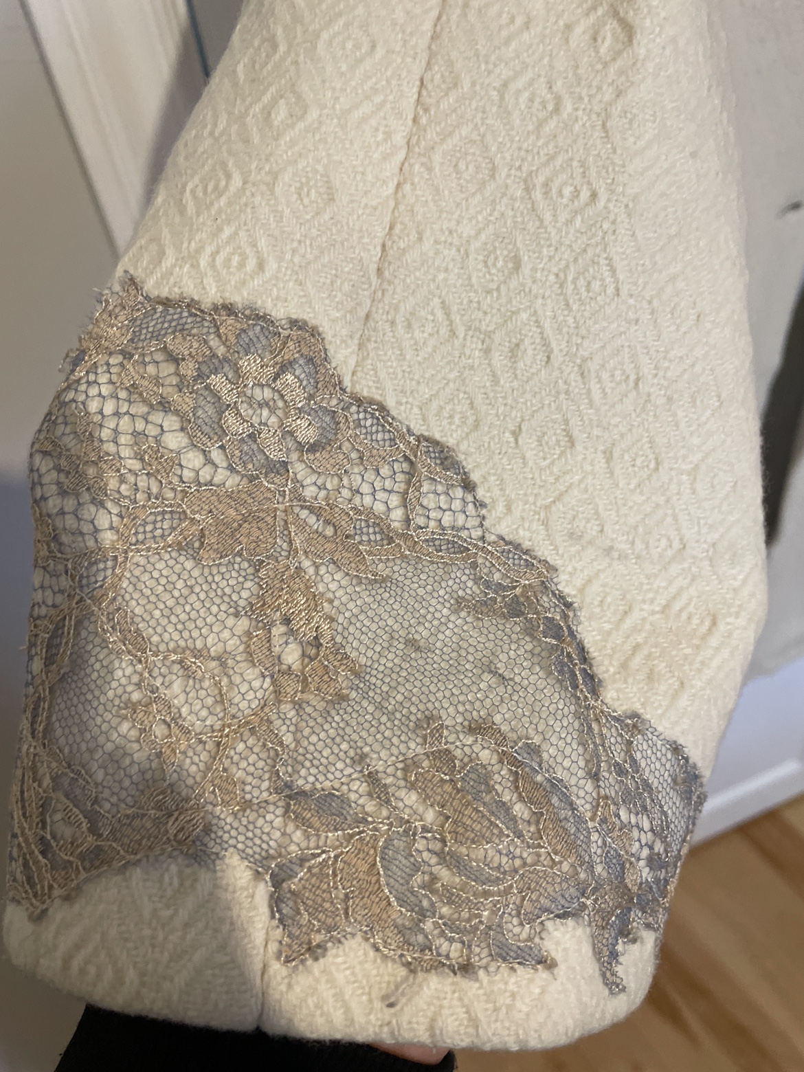 Cream color fall designer coat. image indicator(2)