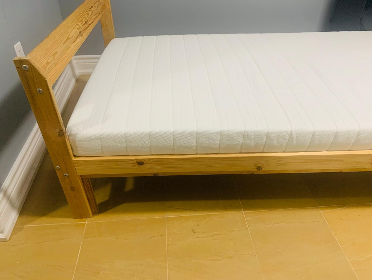 Twin size Bed frame with brand new Ikea mattress