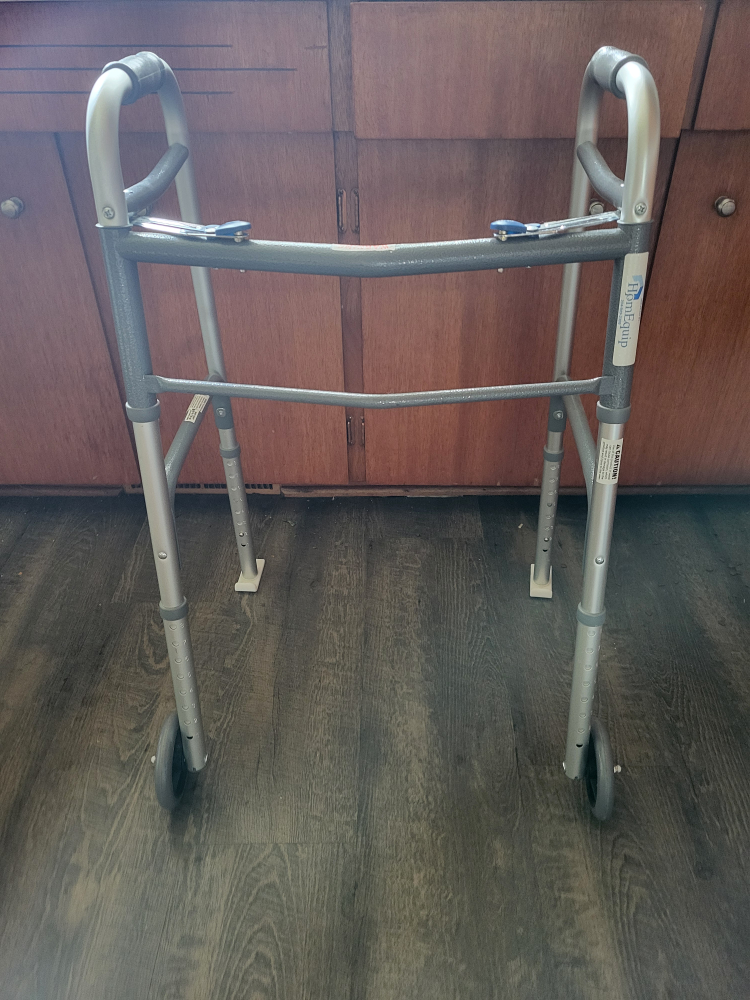 Folding Walker, adjustable 2 Wheels. Meet up at Unicity mall.