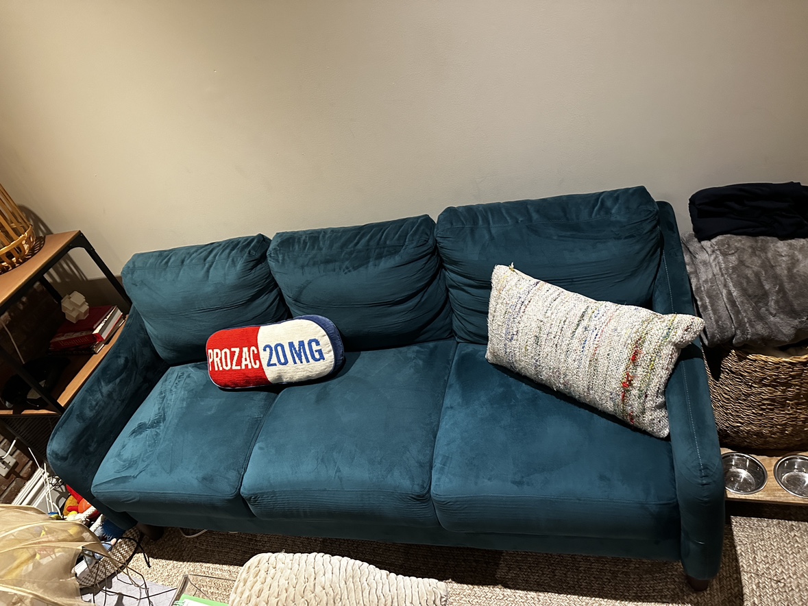Three seater green Sofa