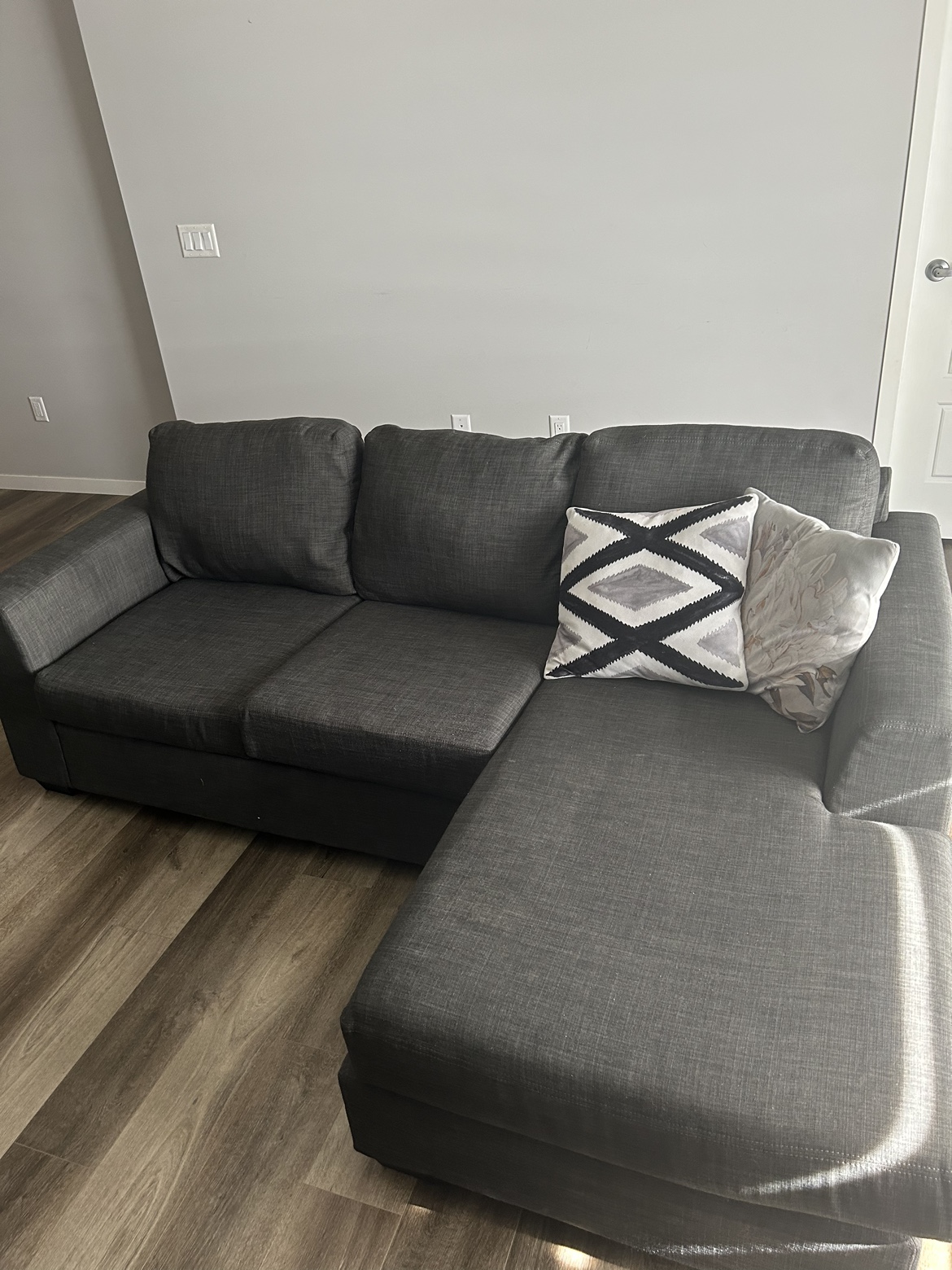 Grey Sectional with throw pillows
