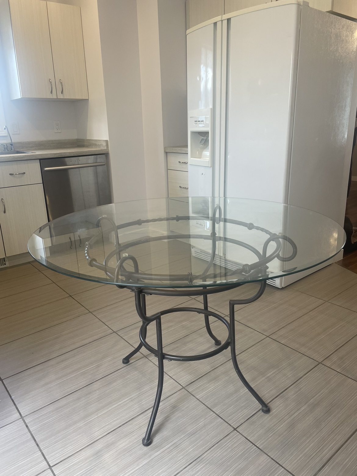 Round glass dining table (45” diameter)
