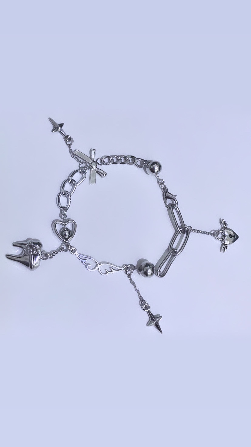 Silver Tooth and Winged Heart Bracelet (Handmade) thumbnail