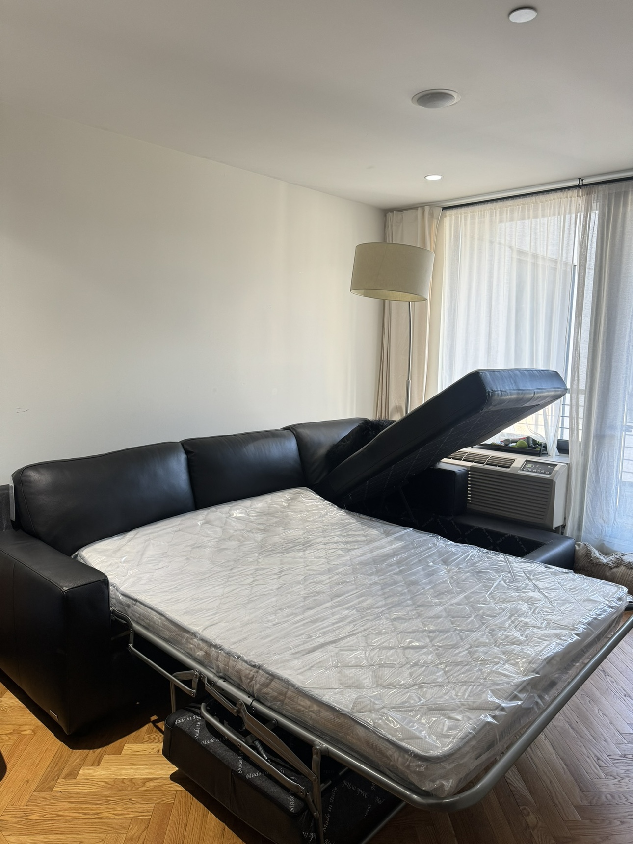 BRAND NEW* Black Italian Leather Sleeper Couch with Storage