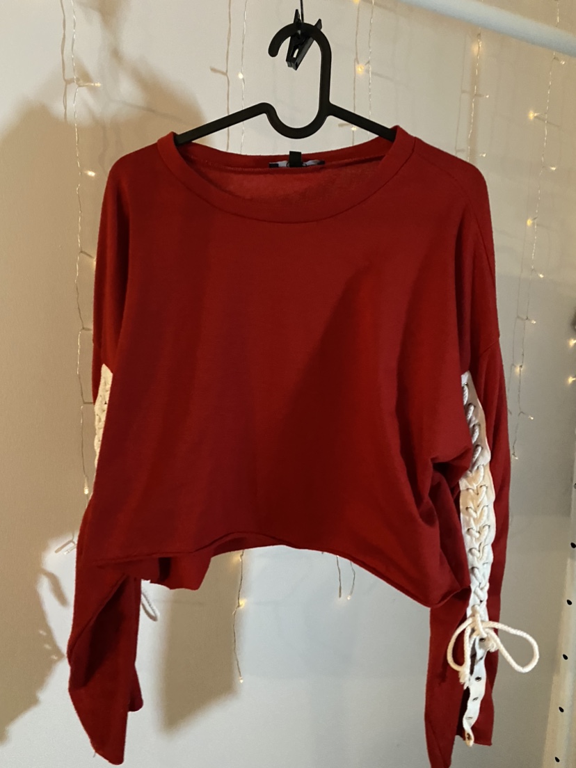 Red long sleeve shirt with white laces on sleeves thumbnail