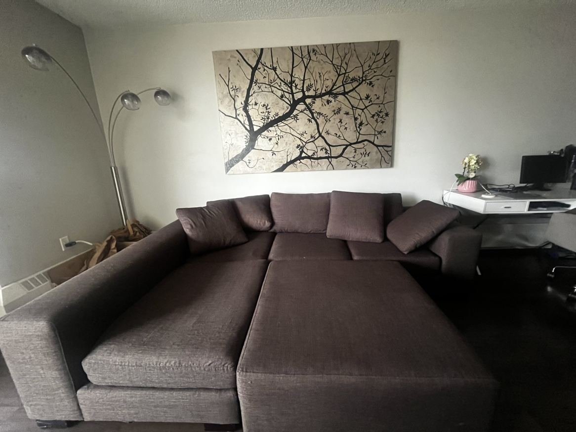 Large dark grey sectional with ottoman - photo 3