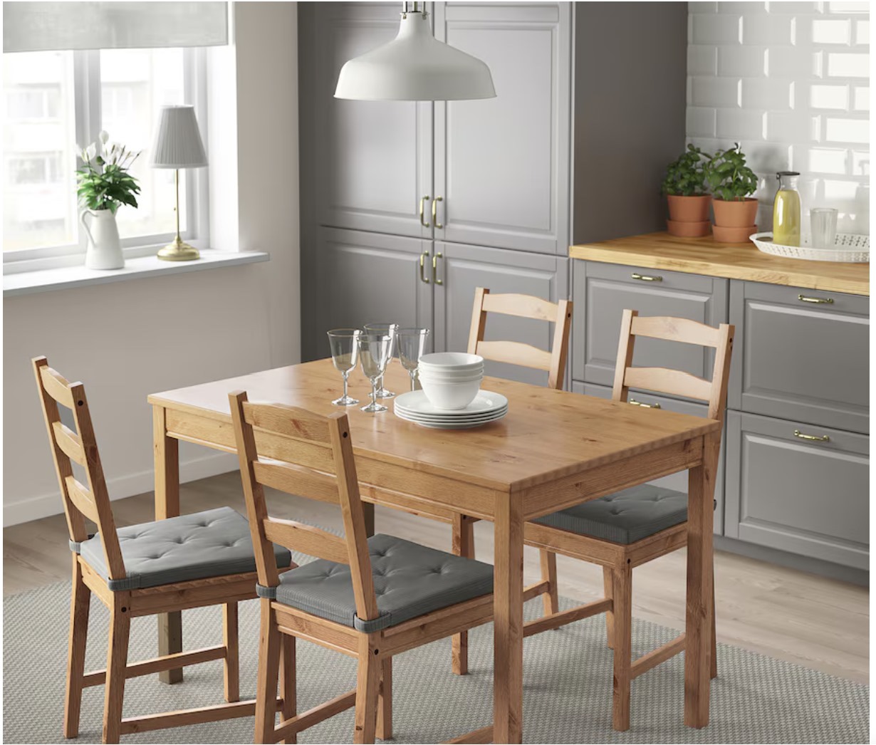 IKEA table and 4 chairs with chair pads
