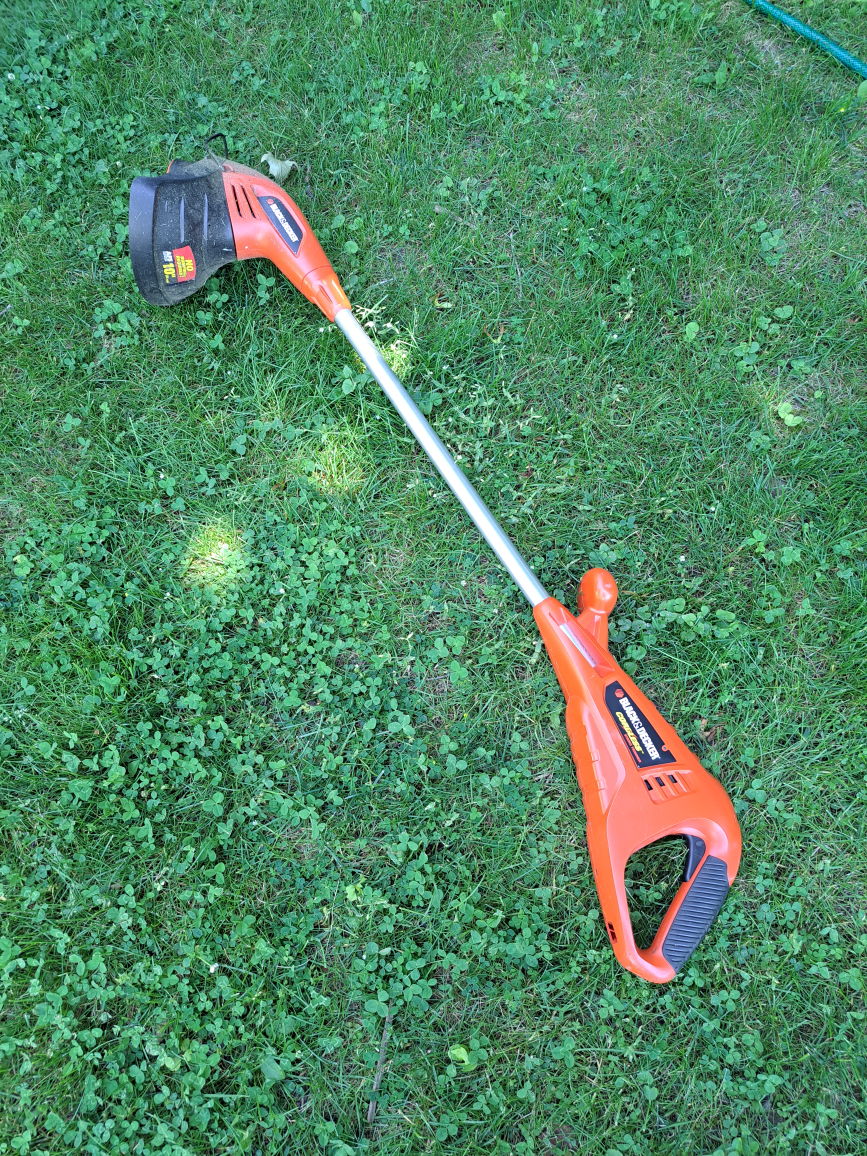 battery power trimmer with charger thumbnail