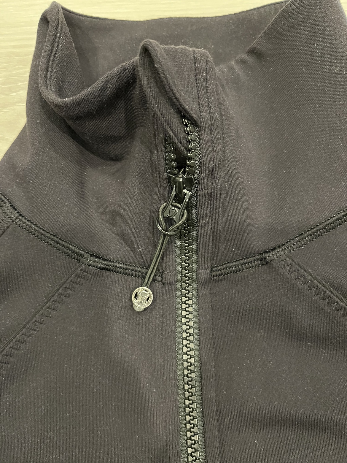 Lululemon Size 2 Black zip up image indicator(5)
