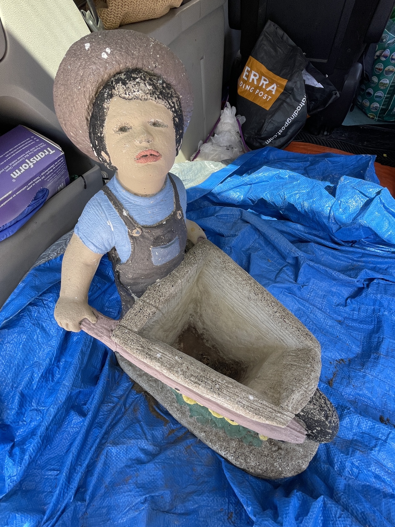 Cement Garden statue- boy with wheelbarrow planter