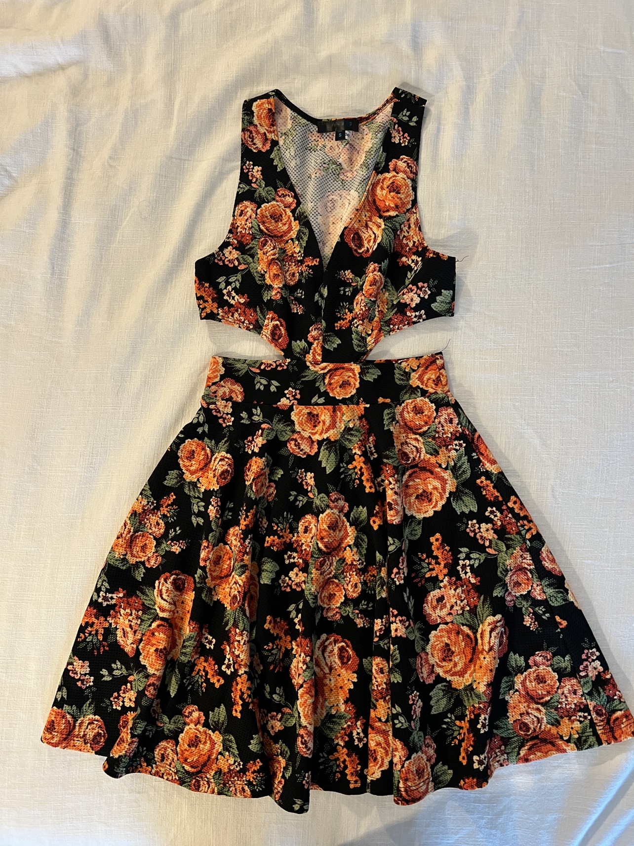 Black floral dress with side cutouts