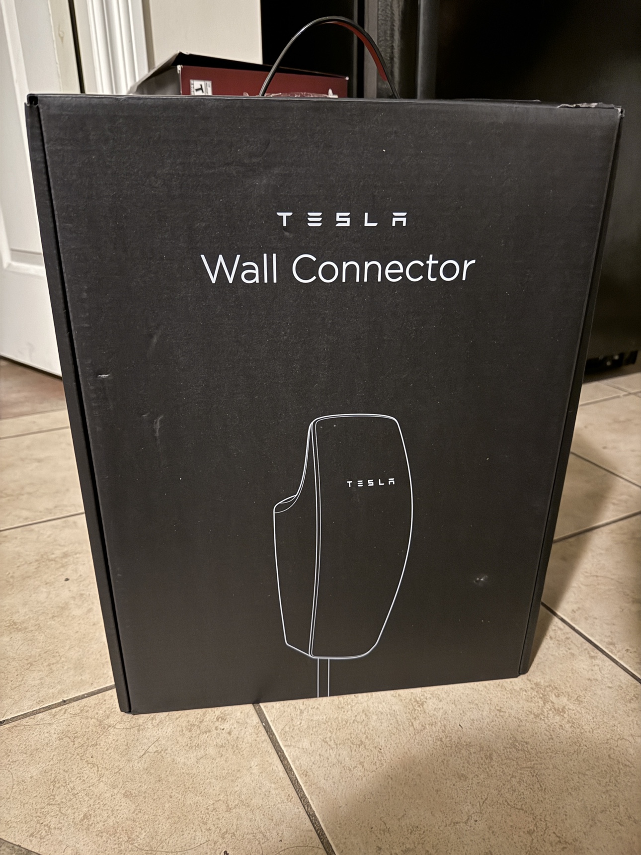 Brand new tesla wall connector