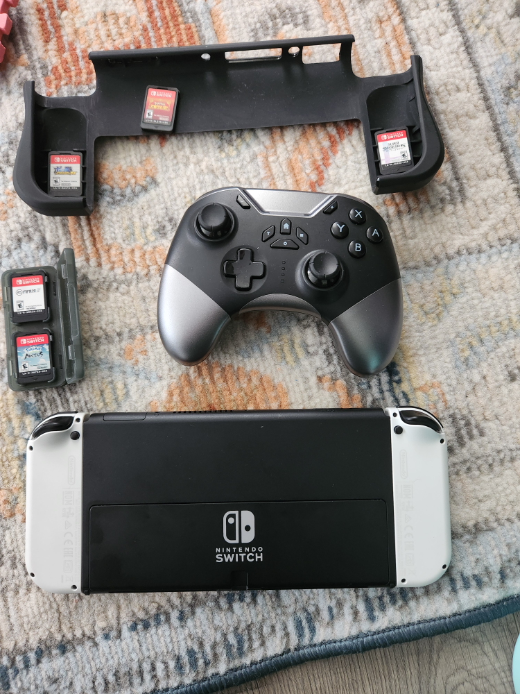 nintendo switch oled with games