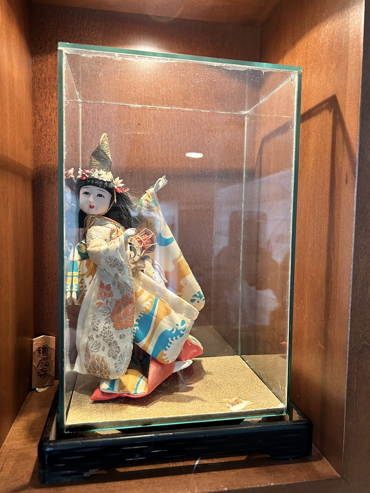 Japanese Figure in Glass case