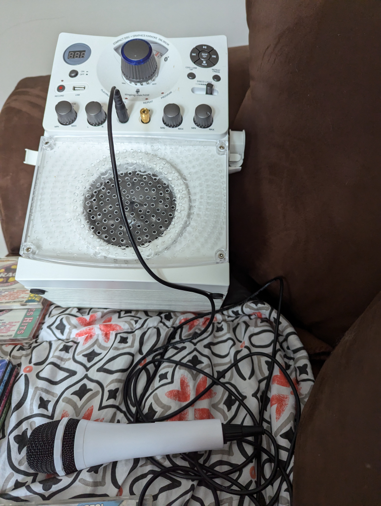 karaoke machine and lots cds