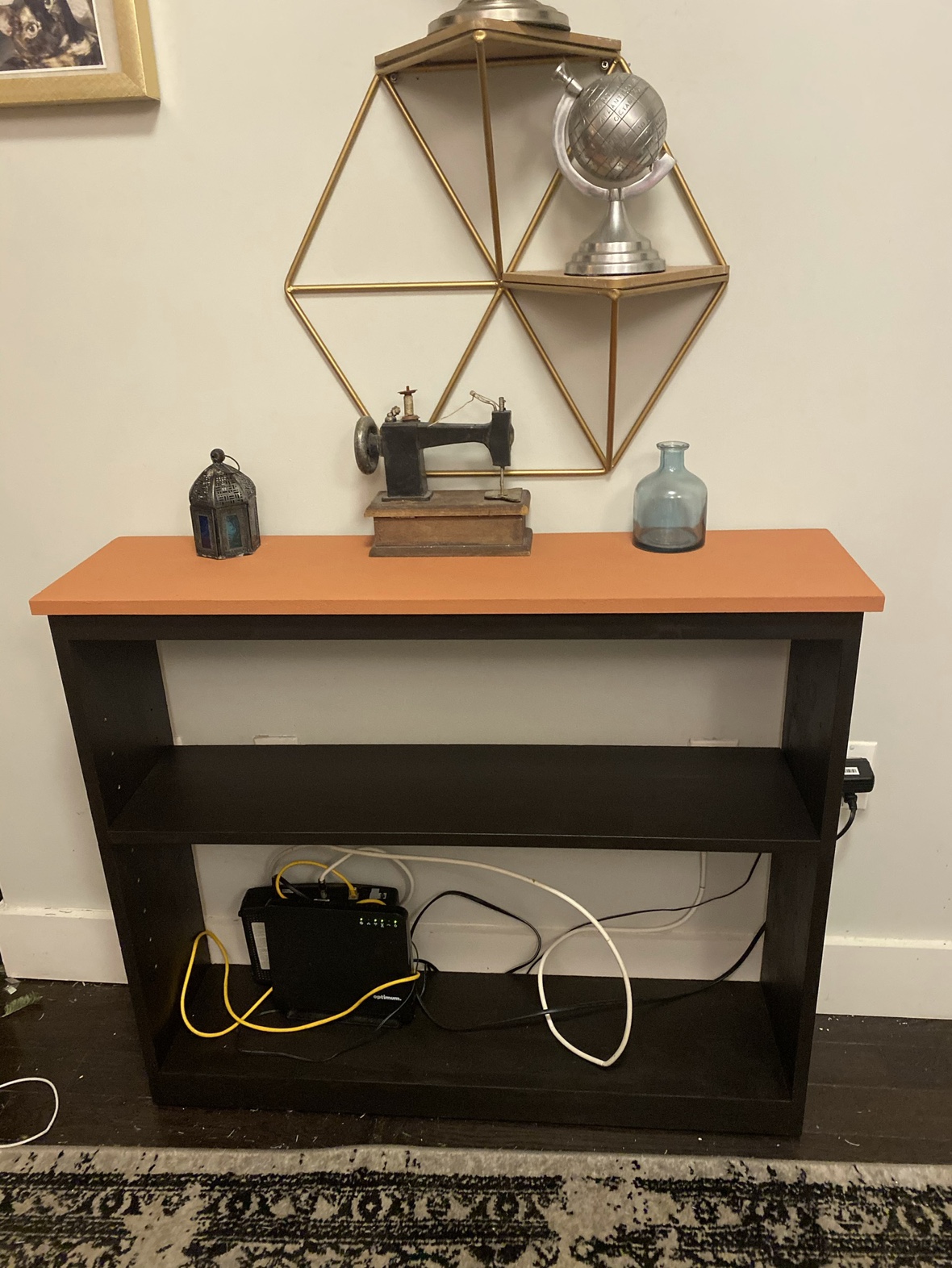 Black and terracotta bookshelf