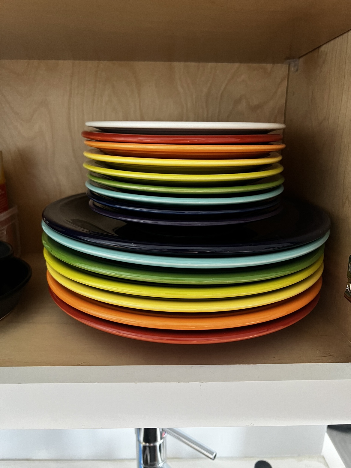 Fiesta brand plates and bowls, various colors and sizes