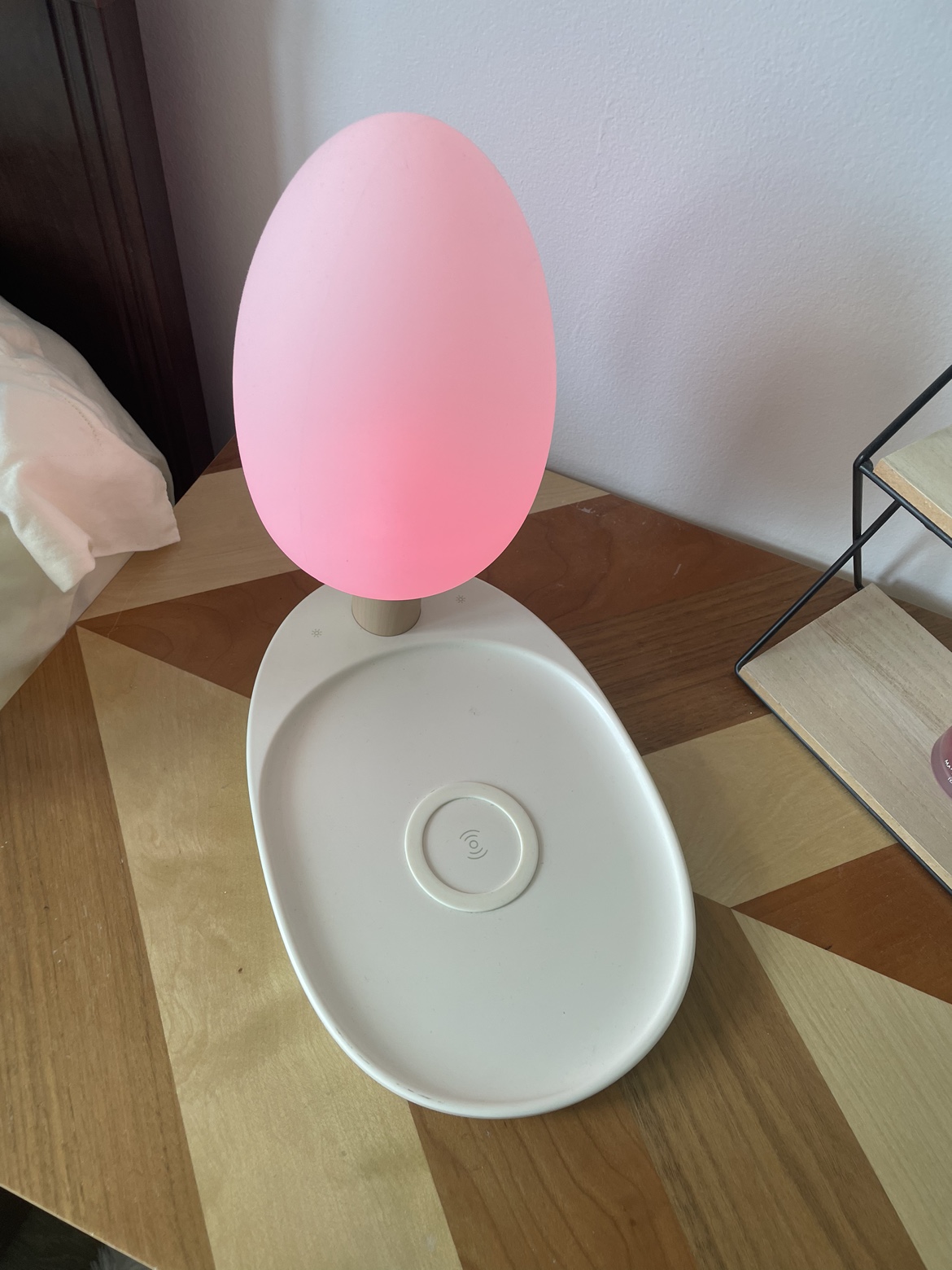 Wireless phone charging pad with lamp