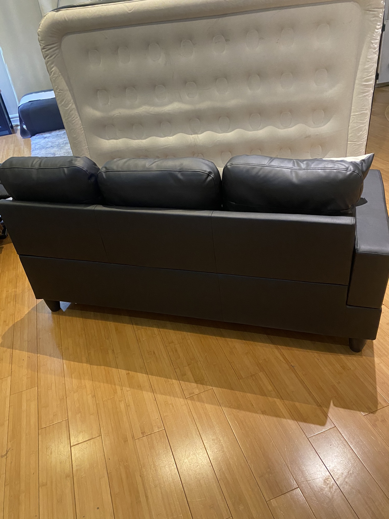 Ahsanul Black Faux Leather sofa image indicator(3)