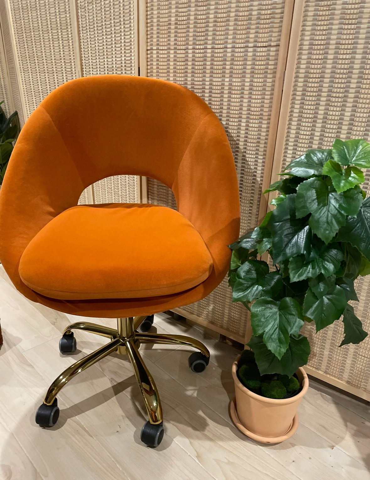 Orange rolling desk chair