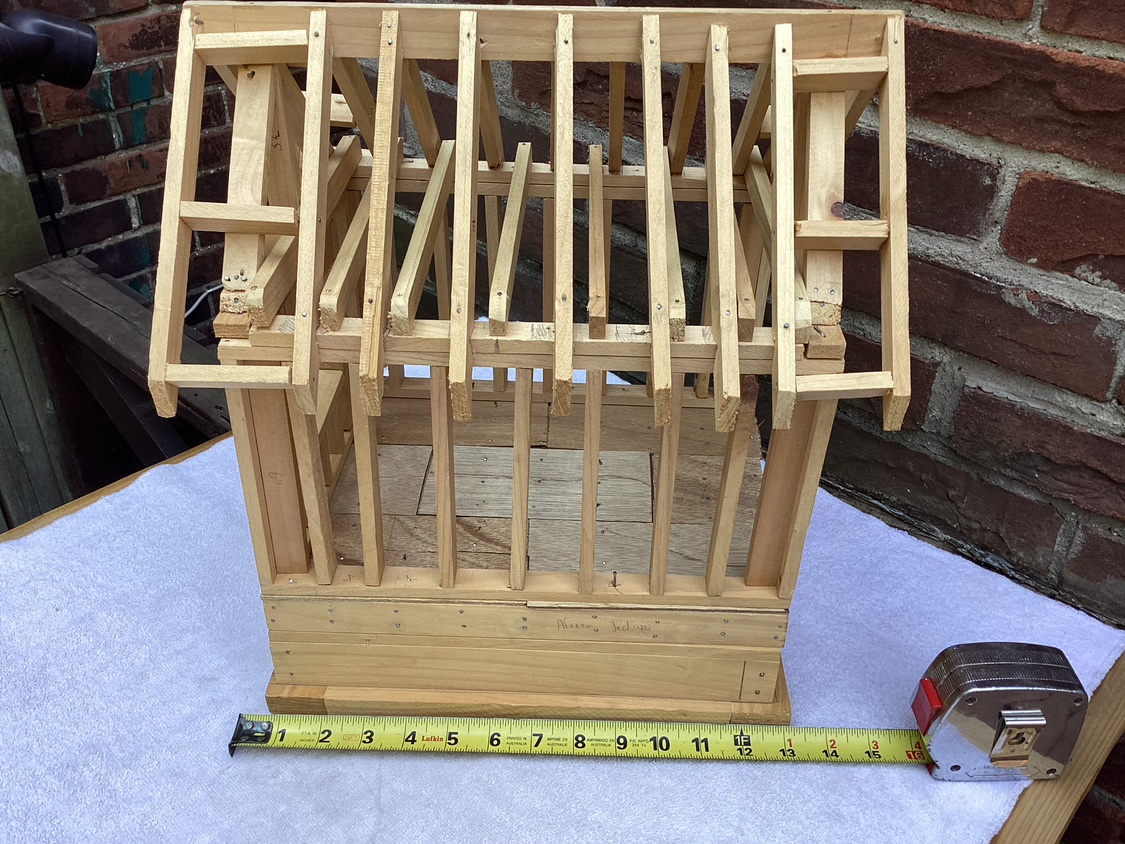 Model unfinished wood construction of a house ! image indicator(5)