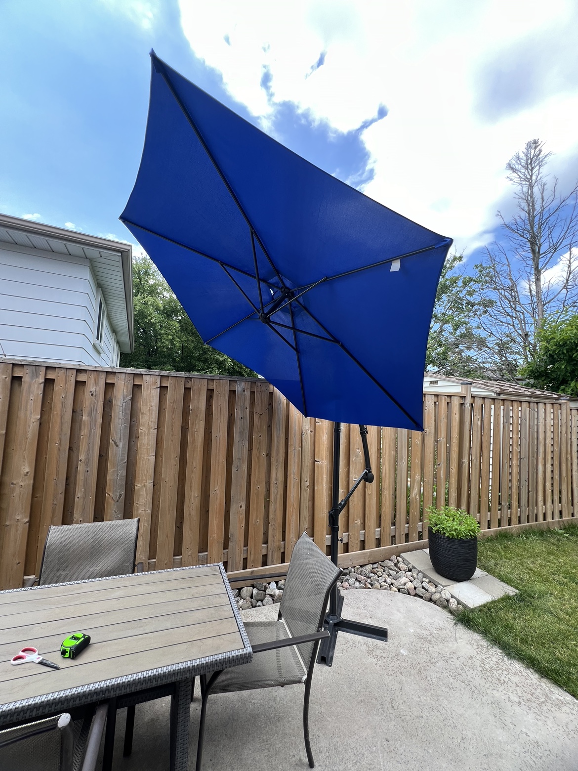 Outdoor umbrella with stand