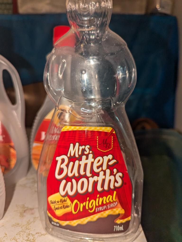 Aunt Jemima bottle and a Mrs. Butterworth bottle collectables image indicator(2)