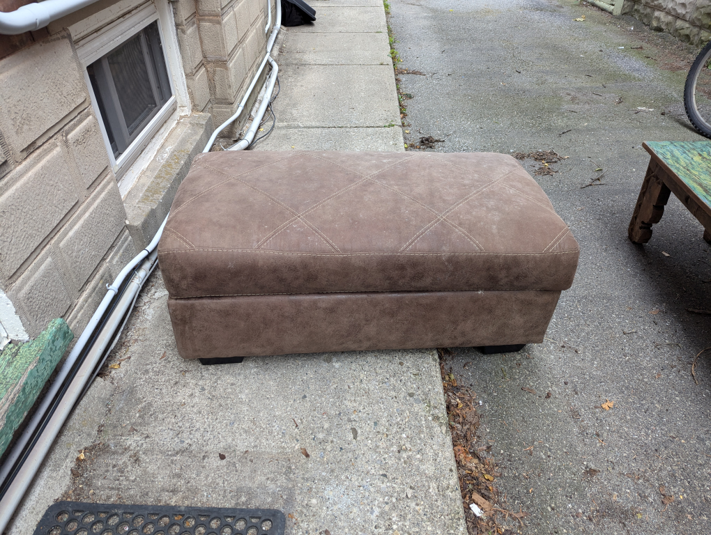 beige suede ottoman with storage