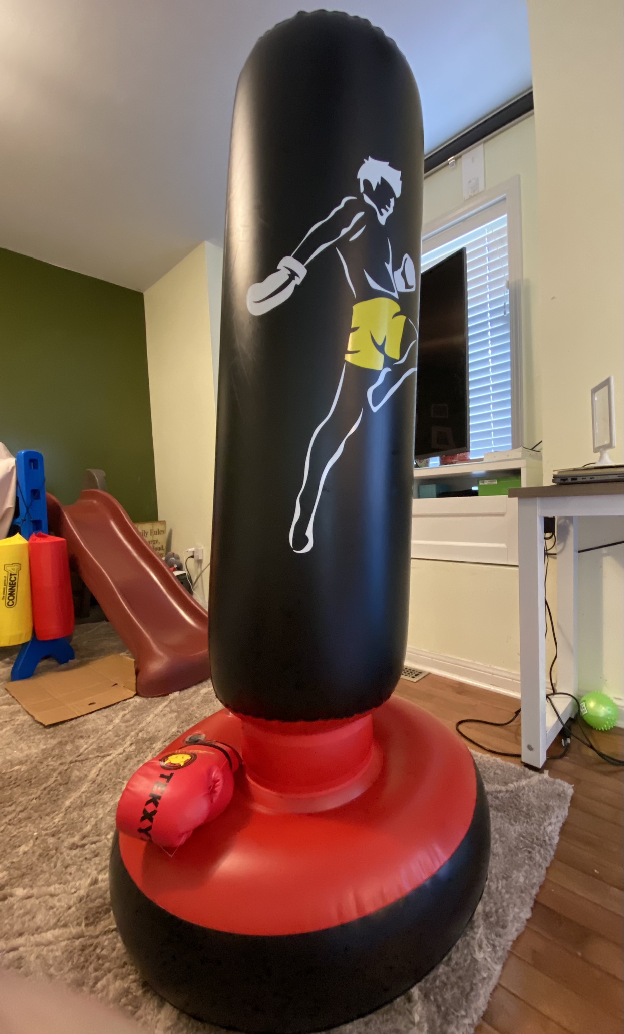Kids inflatable punching bag with pair of gloves