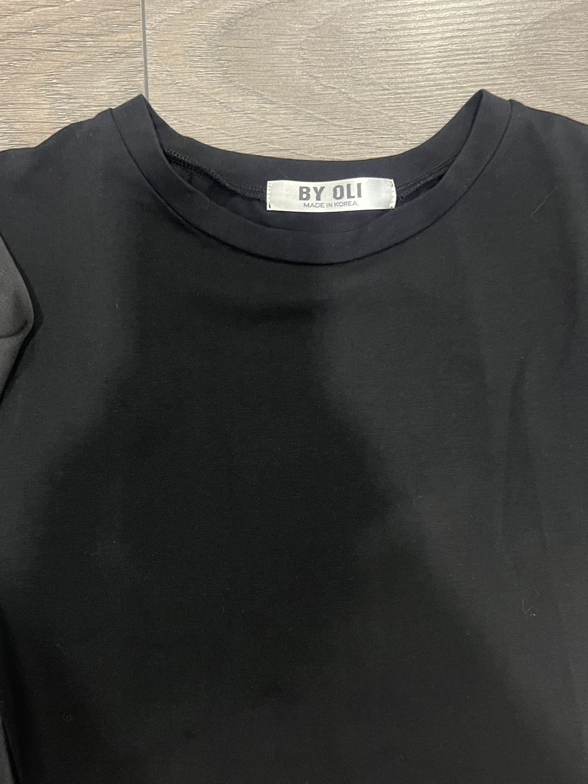 Black sleeveless raffles top image indicator(3)