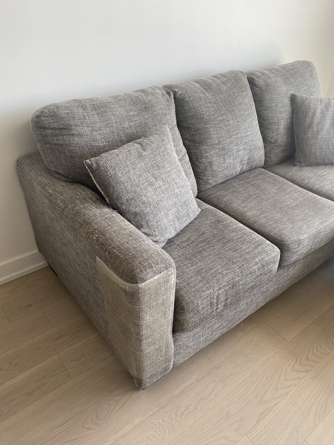 3-person L-shaped grey couch with matching cushions - photo 2