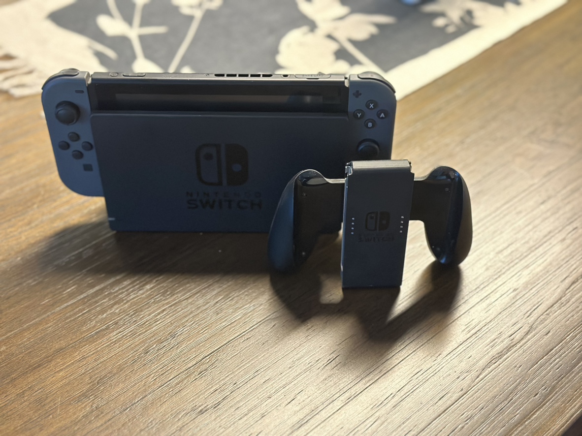 Nintendo Switch game console with one controller