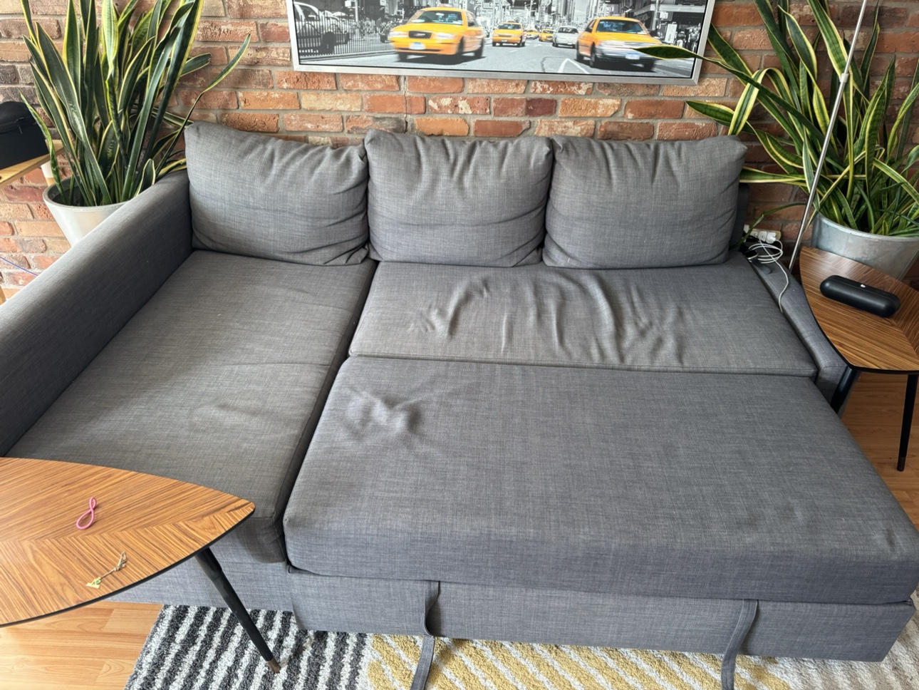 Corner sofa-bed with storage