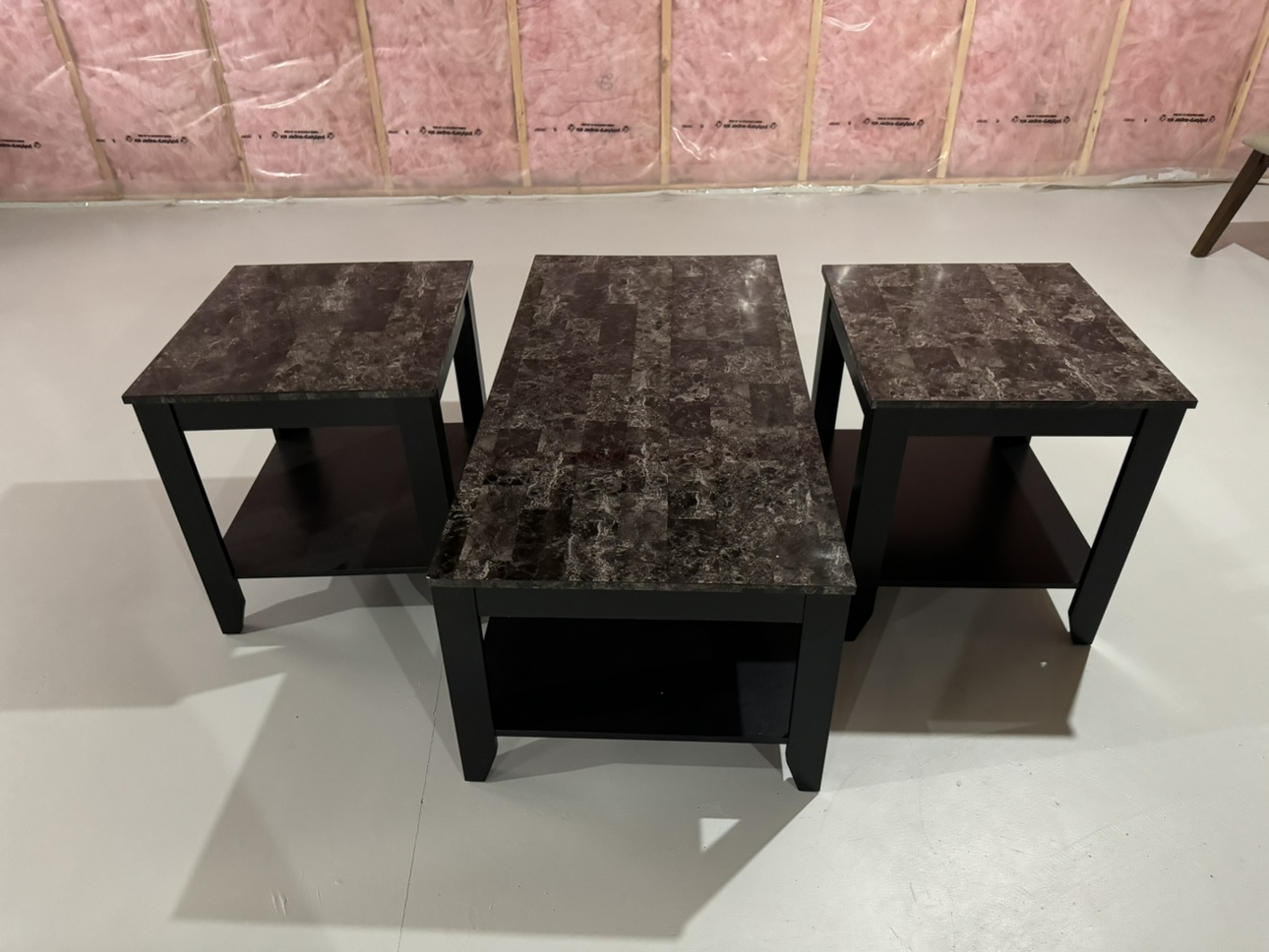 2 small and 1 large laminated marble top tables