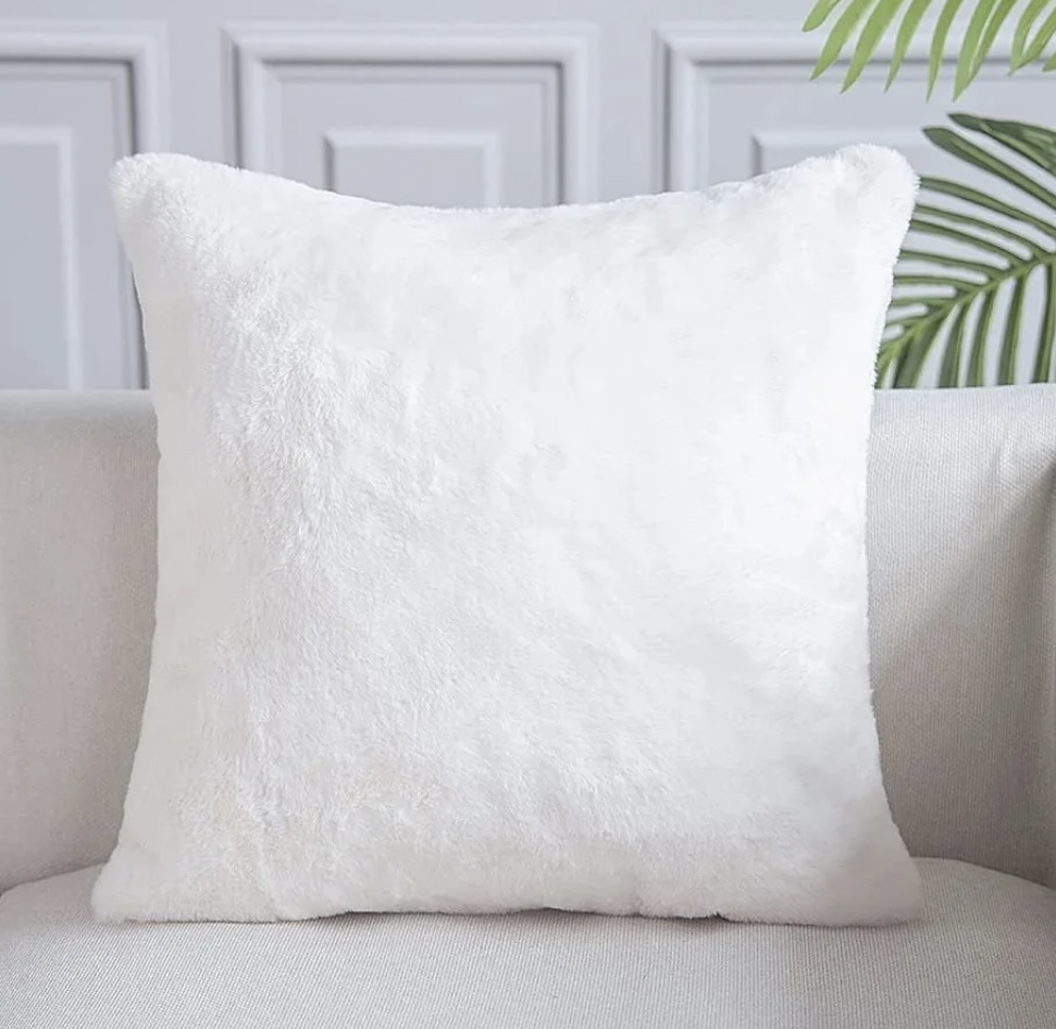 VACUUM SEALED, unopen, cream colored faux rabbit fur pillows thumbnail