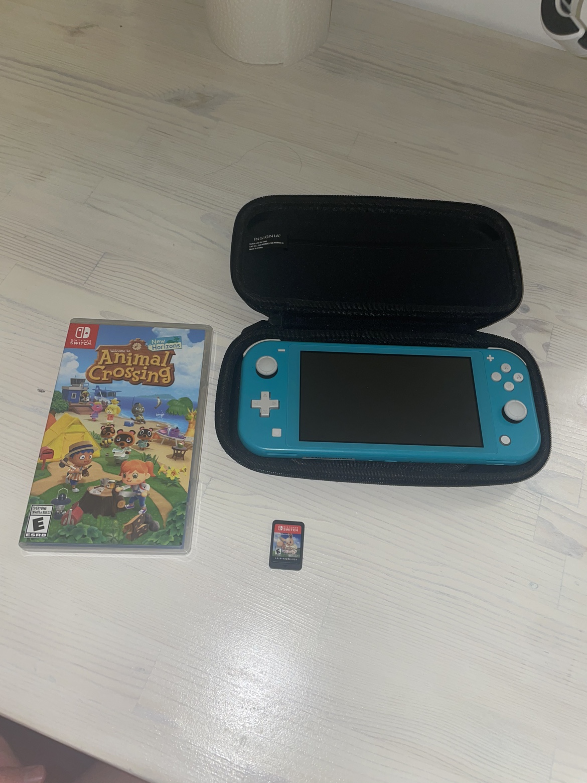 Nintendo Switch Lite w/ 2 games and Travel Case