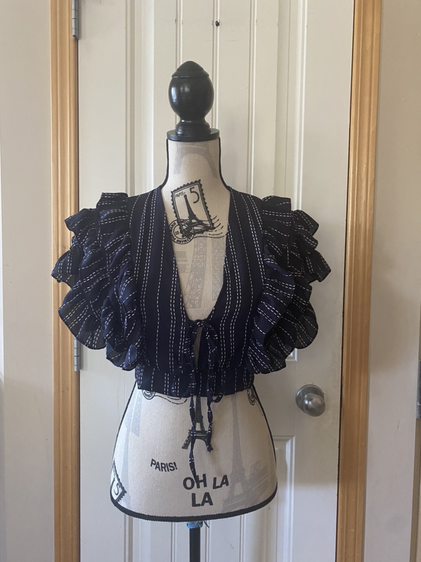 Crop top with ruffles.