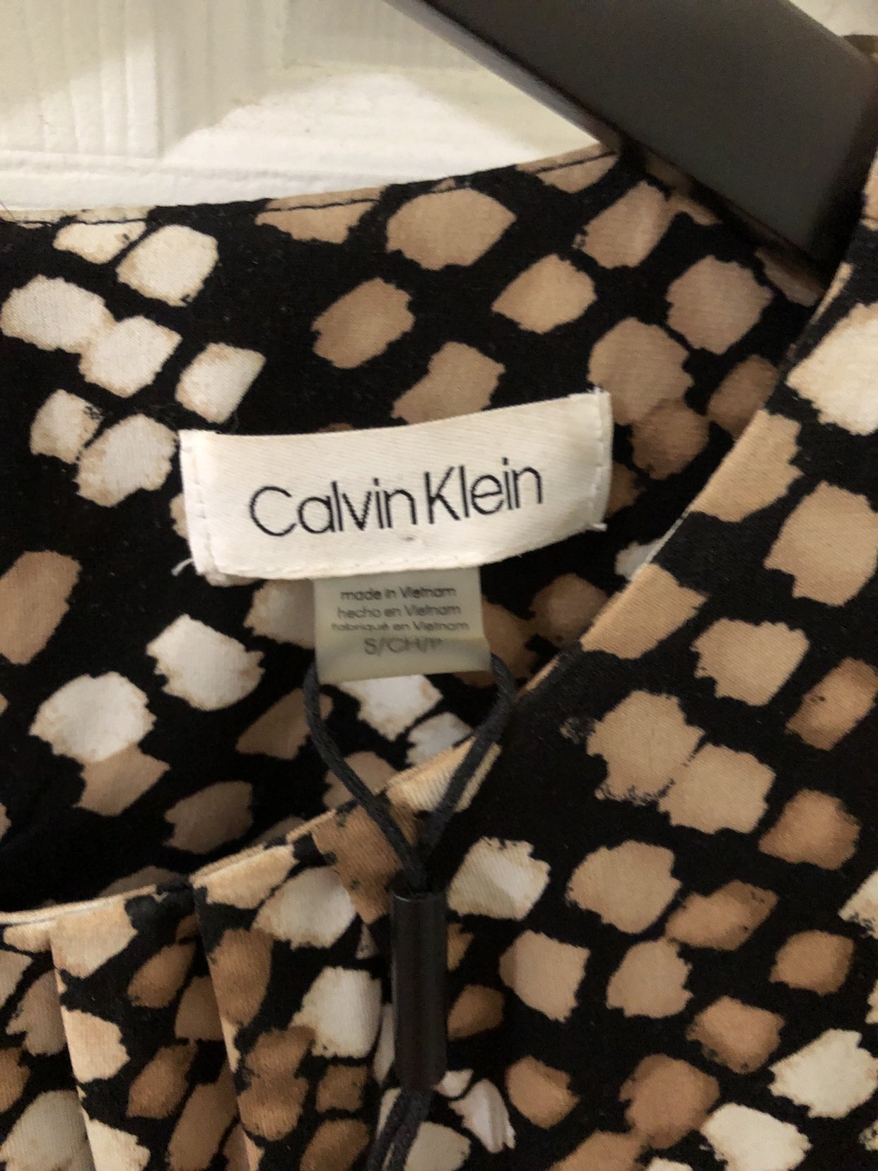 Calvin Klein Printed sleeveless blouse. Orig cost $55.00 image indicator(3)