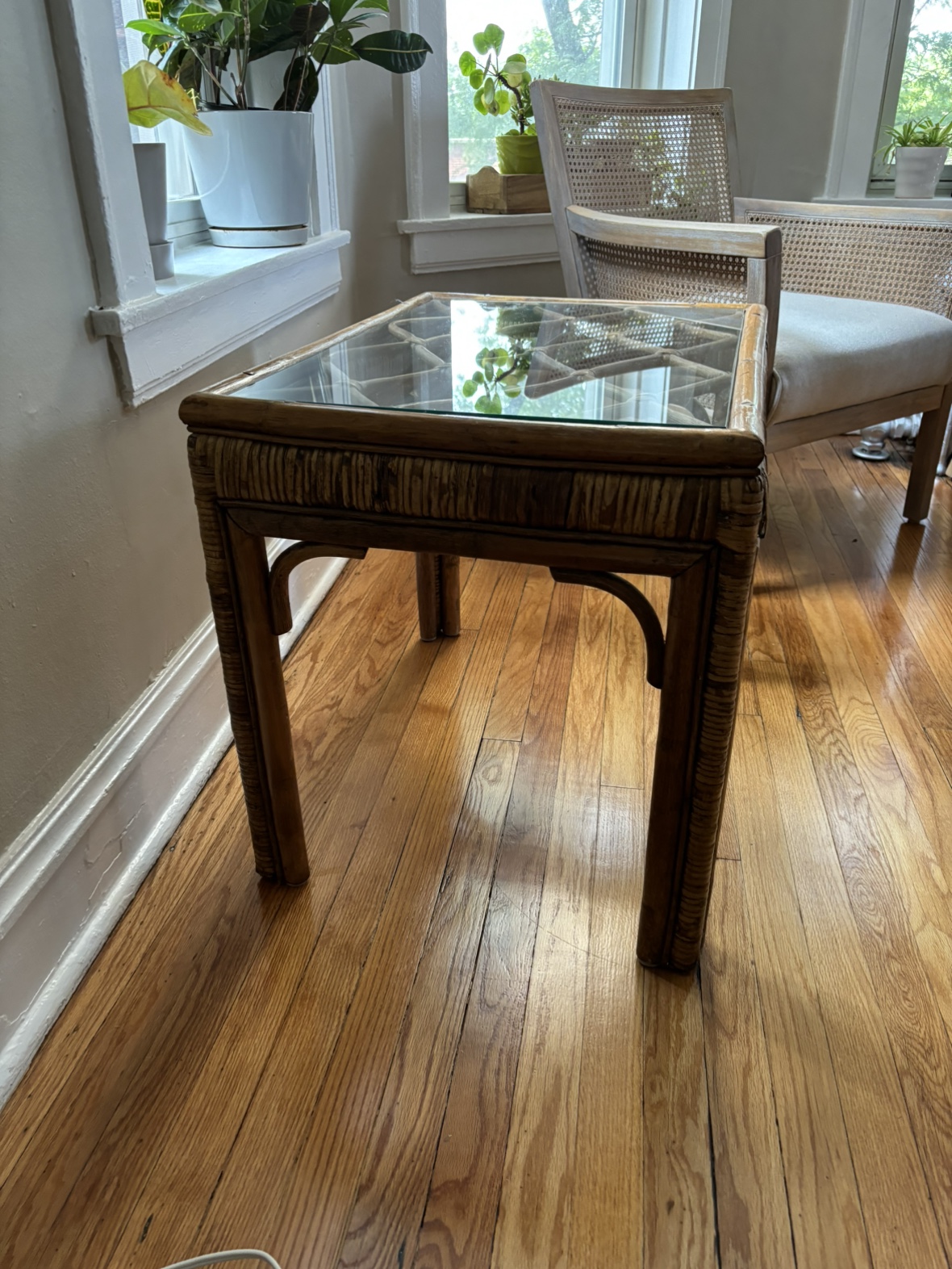 Rattan side table with glass top