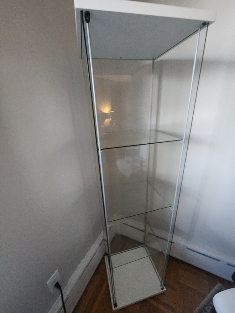 glass shelving unit with no door