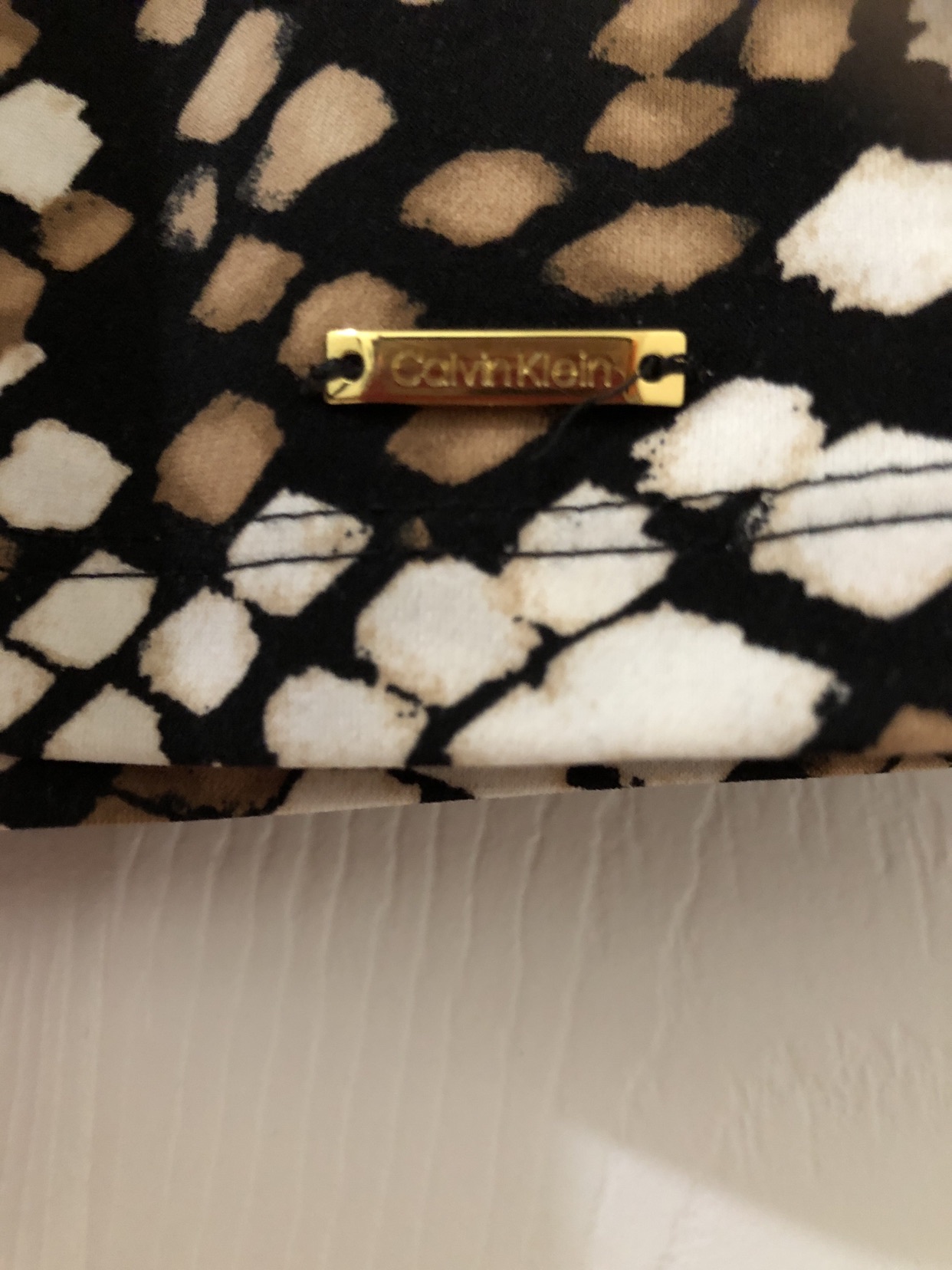 Calvin Klein Printed sleeveless blouse. Orig cost $55.00 image indicator(7)