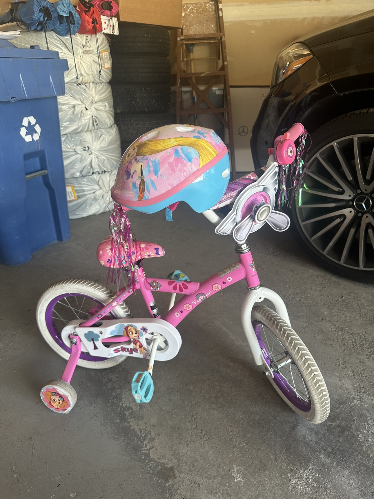 Small girl bike, helmet and ring bell included.