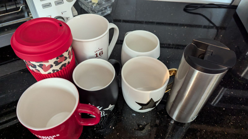4 Starbucks mugs and 2 travelling cups - photo 2